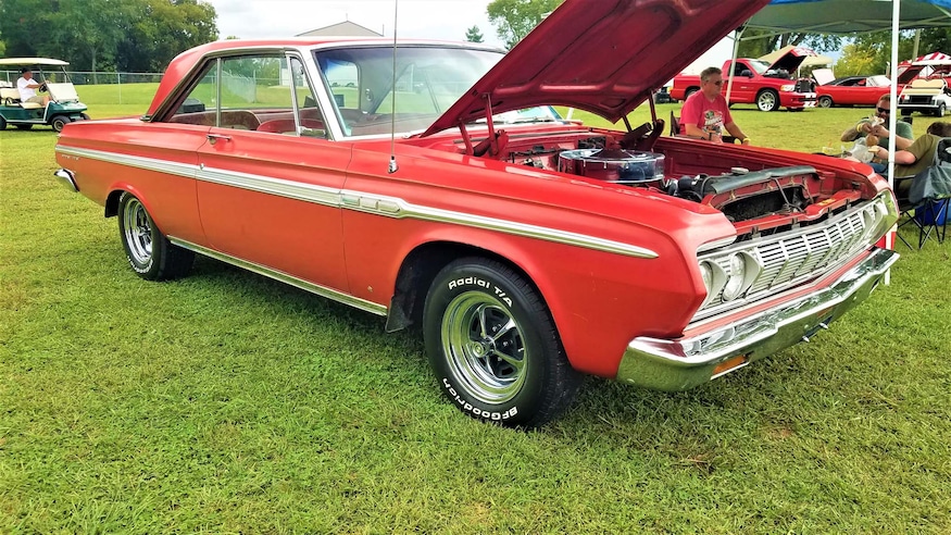 002 1964 plymouth sport fury red front right hood