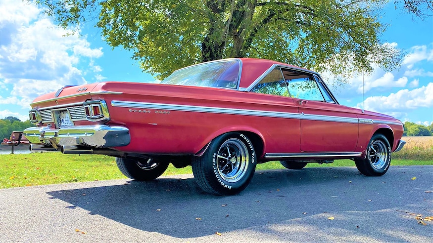 005 1964 plymouth sport fury red right rear low