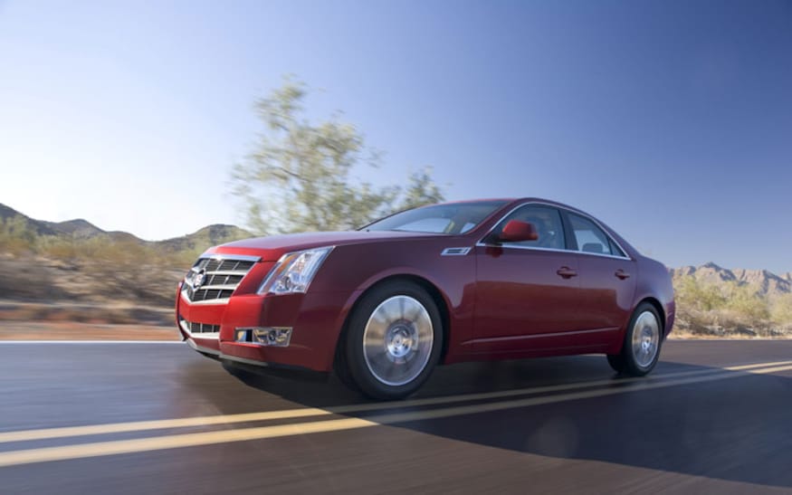 112_0806_01z 2009_cadillac_CTS front_three_quarter_motion_view